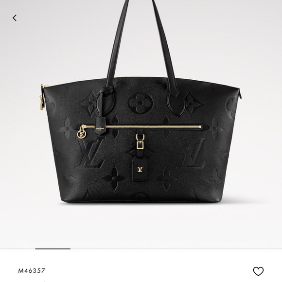 Louis Vuitton Black Travel Bag with Textured Leather and Gold Accents - Picture 1 of 10